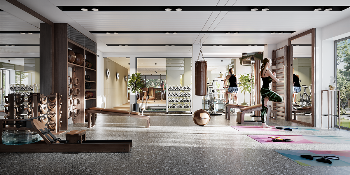 A bright open space. A fully equipped residents' gym, complete with weights and machinery.