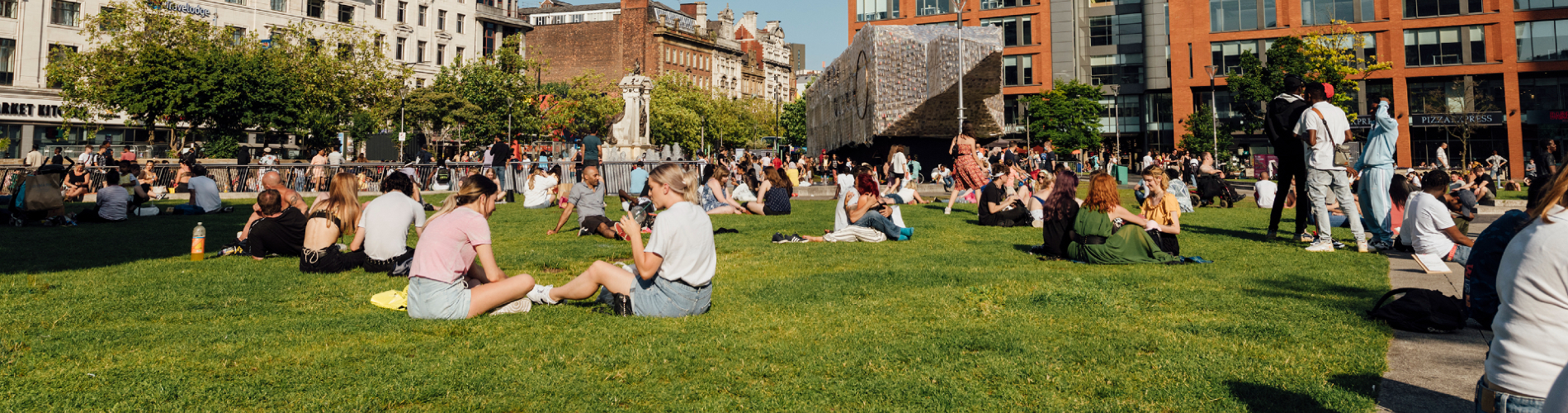 People outside at Potato Wharf Manchester